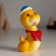 Polystone souvenir "Yellow snake in a blue hat and red bow" 5x4x9 cm
