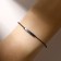 Bracelet of desires "hematite" cube on a black thread, the length is regulated