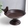 Souvenir cast iron stand "Bird sits on a plate" 13x17x20 cm