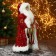 Santa Claus "in a red suit, with a patterned staff and a flashlight" 27x50 cm