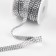 The rhinestones are thermoclayes, width - 10 mm, d = 3 mm, 4.5 ± 0.5 m, silver color