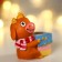 Souvenir Polystone SPRISE "Gobby in a scarf with a cake"