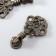 Handle for the casket Metal "Vegetable ornament" bronze 5.8x2.8 cm