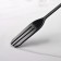 Spoon of barn stainless steel with a fork, length 32.5 cm, black color