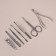 Manicure set, 7 items, in case, gray/golden drawing