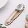 A teaspoon spoon with an engraving of "beloved dad", h = 14cm.