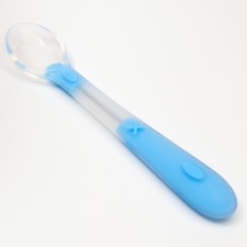 A spoon of a nursery for feeding silicone, from 5 months., Blue color