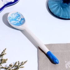 A teaspoon spoon with painting 