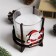 Aromatic candle in a glass on the stand "Santa Claus", 10x9.5x9 cm, mint