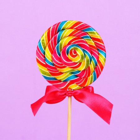 Caramel candy curly Sweet Ness is a large disk with a bow, the taste of cherry color 100 g-1