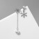 Earrings with pearls "snowflakes", asymmetry, white color in silver