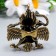 Souvenir brass "Garuda" 4,1x3.5 cm