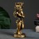 The candlestick "Angel" in the left hand, gold, 14x8x22 cm, for a candle d = 4 cm