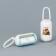 Container with packets for cleaning the dogs "I'm in the moment", the color is white