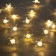 Garland “thread” 2 m Rosa with nozzles “Zvezda”, IP20, silver thread, 20 LED, glow warm white, 2 modes, AAX2