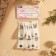 Tag with the “Rocket” button, 5 × 2 cm, 10 pcs, white/black color