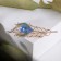 Brooch "Pavli Pavin", colored in pink gold