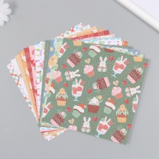 A set of scrapbooking paper 12 sheets 12 designs 