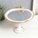 Standing interior polystone with a mirror "Golden Torgets" on a leg 28x23x23 cm