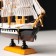 Souvenir Small Small “Three -Mature”, black sides with a white strip, white sails, 20 × 5 × 19 cm