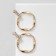 Earrings with rhinestones "Age", white color in gold