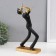 Souvenir Polystone "soloist" black with gold 14x8x27 cm