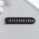 Keychain plastic "license plate" black 7x4 cm