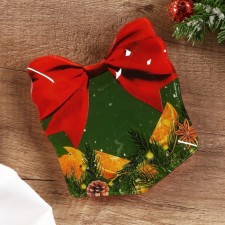 A plate in the form of a gift 