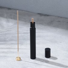 Penal for storing incense, black, metal, with incense