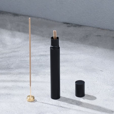 Penal for storing incense, black, metal, with incense