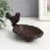 Souvenir cast iron stand "Bird on the sheet" 18x9x8 cm