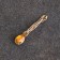 Koshelleka souvenir "Spoon of Zareklushka", with natural amber