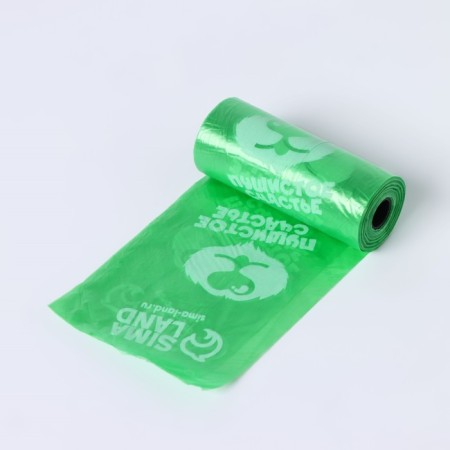 A container with a flashlight, cleaning packages for dogs (roll 15 pcs), green-7