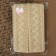 Knitted lace, 60 mm × 10 ± 1 m, beige color