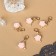 Sharmik "Flower" rose, white-pink color in gold