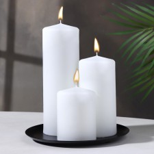 Set of candles-cylinders on the stand 
