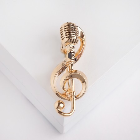 Retro microphone brooch with a note, color gold
