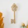 Panel interior polystone "openwork key" gold with a white patina 6.5x1x17 cm