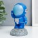 Souvenir Polystone "Astronaut on the Moon" bright blue 11.5x6.5x6.5 cm