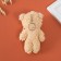 Tekstil Bloher "Bear with an openwork bow" 8x5x13 cm