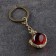 Souvenir-codes "Snake with a ball", brass, amber, 2x2x8 cm