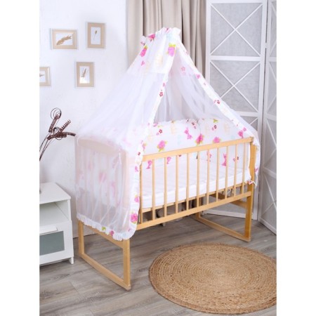 A set of sides in a crib with a canopy cane