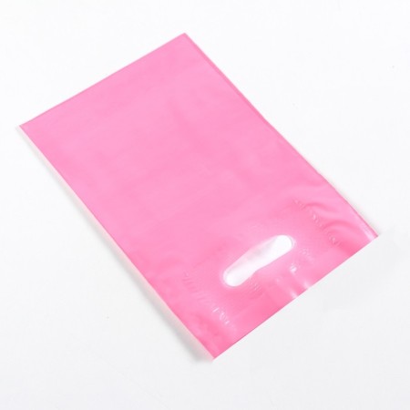 Polyethylene package with a cut handle, pink 20-30 cm, 70 μm-1