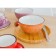 Porcelain bowl Wilmax Splash, 600 ml, d = 13 cm, orange color