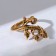 Ring "ring" chameleon, color black gold, dimensionless