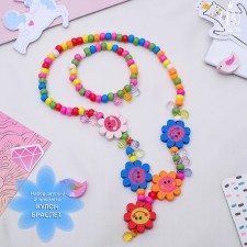 Set of children's “chosen” 2 subjects: pendant, bracelet, chamomile flowers funny