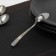 A single spoon is disposable, 12.5 cm, silver color
