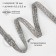 Rhinestones and beads are thermoclayes, width - 10 mm, 4.5 ± 0.5 m, silver color