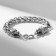 Male Bracelet "Brutal" wolves, color black silver, 22 cm