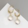 Earrings with pearls "bead" Bright halo, color gold